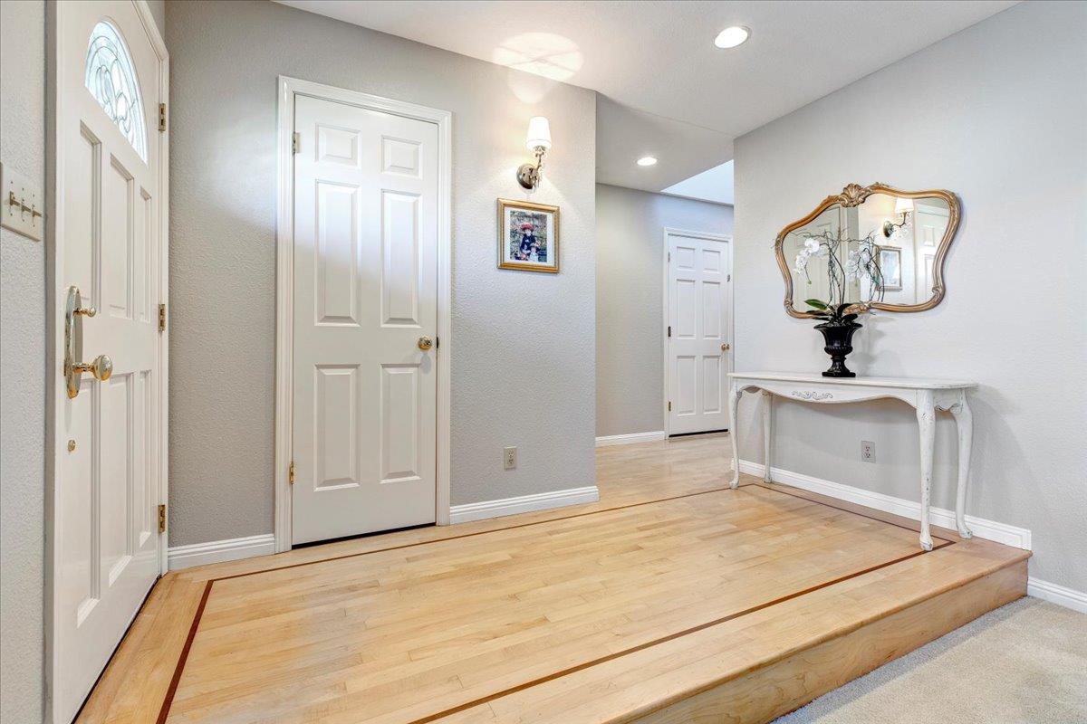 6763 Endmoor Drive San Jose, CA 95119 - Photo 4 of 32 a room with chandelier and wooden floor