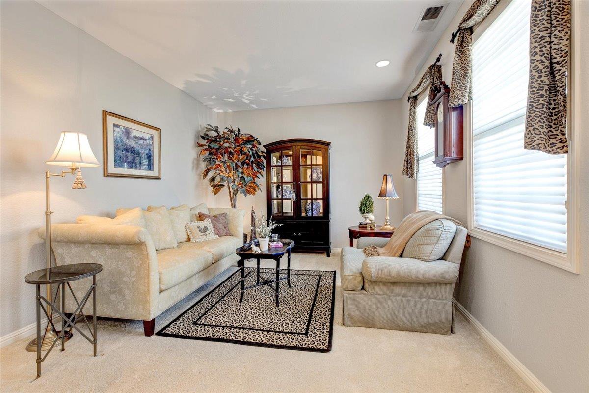 6763 Endmoor Drive San Jose, CA 95119 - Photo 5 of 32 a living room with furniture rug and window