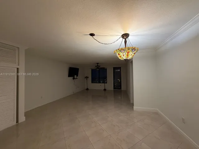 a view of a chandelier and a chandelier in big room