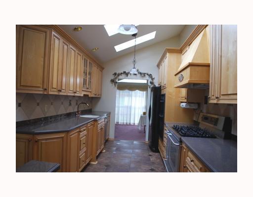476 Denny Road Valencia, PA 16059 - Photo 6 of 17 Kitchen. New Kitchen with Kenmore Elite Stainless 6 Burner Gas Stove w/ double ovens. One is a Convection, Wall Oven and Microwave, Dishwasher, Ceramic Tile Floor & Back Splash w/ Deco Tiles. Corian Counter Tops. One Kitchen Cabinet has lift inside for Mixer
