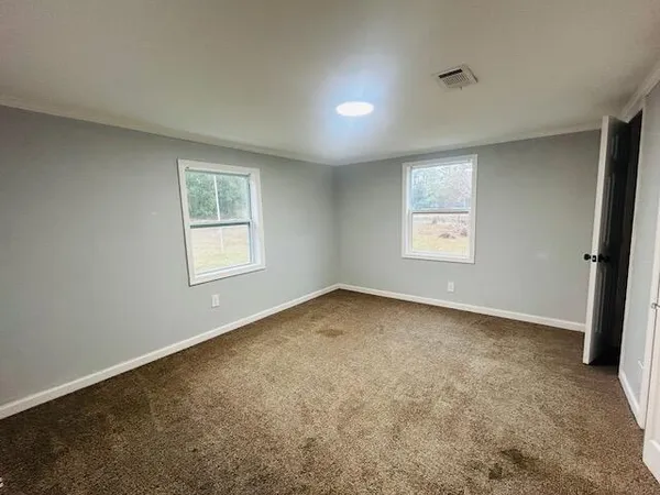 an empty room with a window