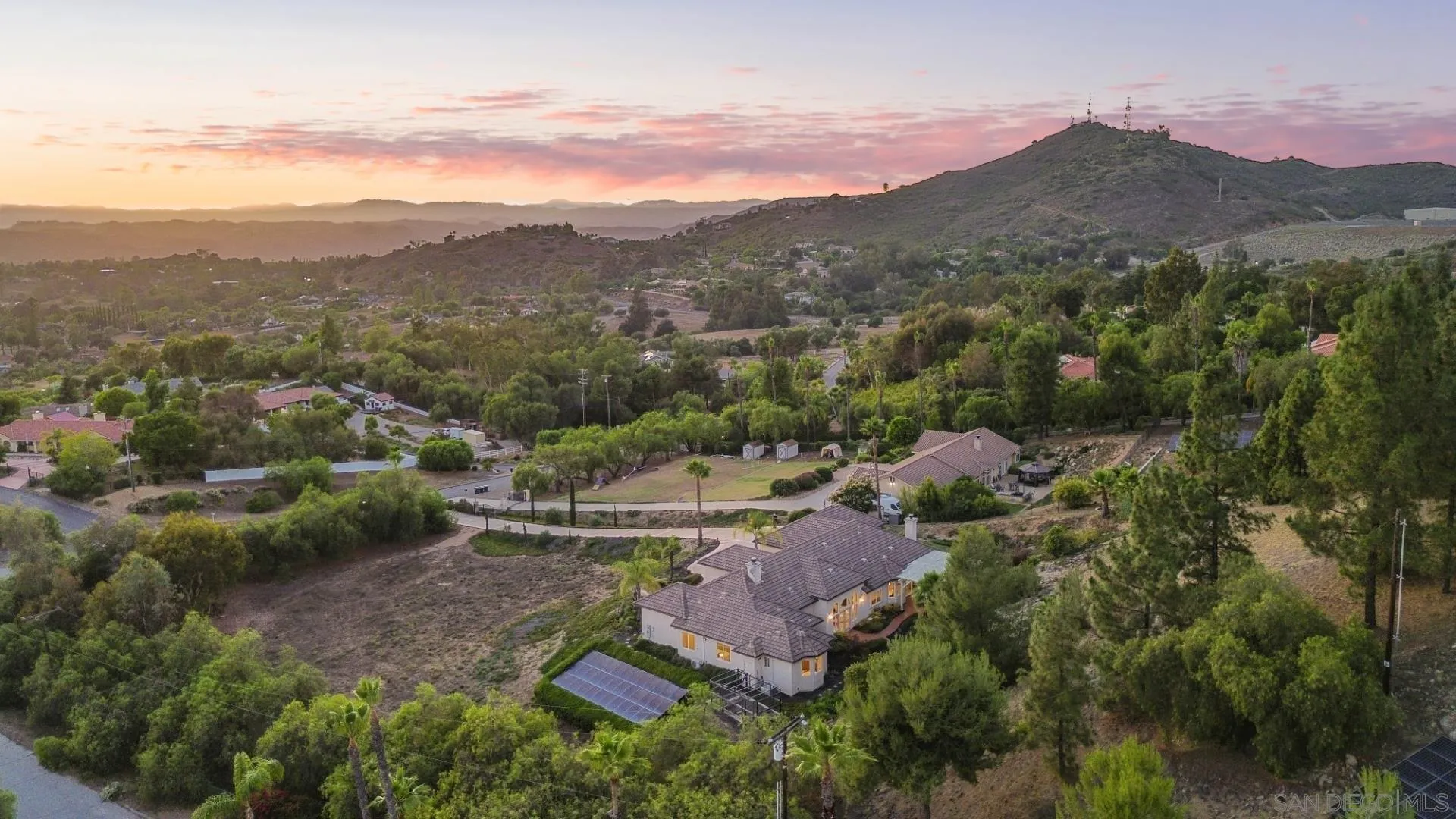 246 Yucca Road Fallbrook, CA 92028 - Photo 2 of 68 an aerial view of residential houses with outdoor space and trees