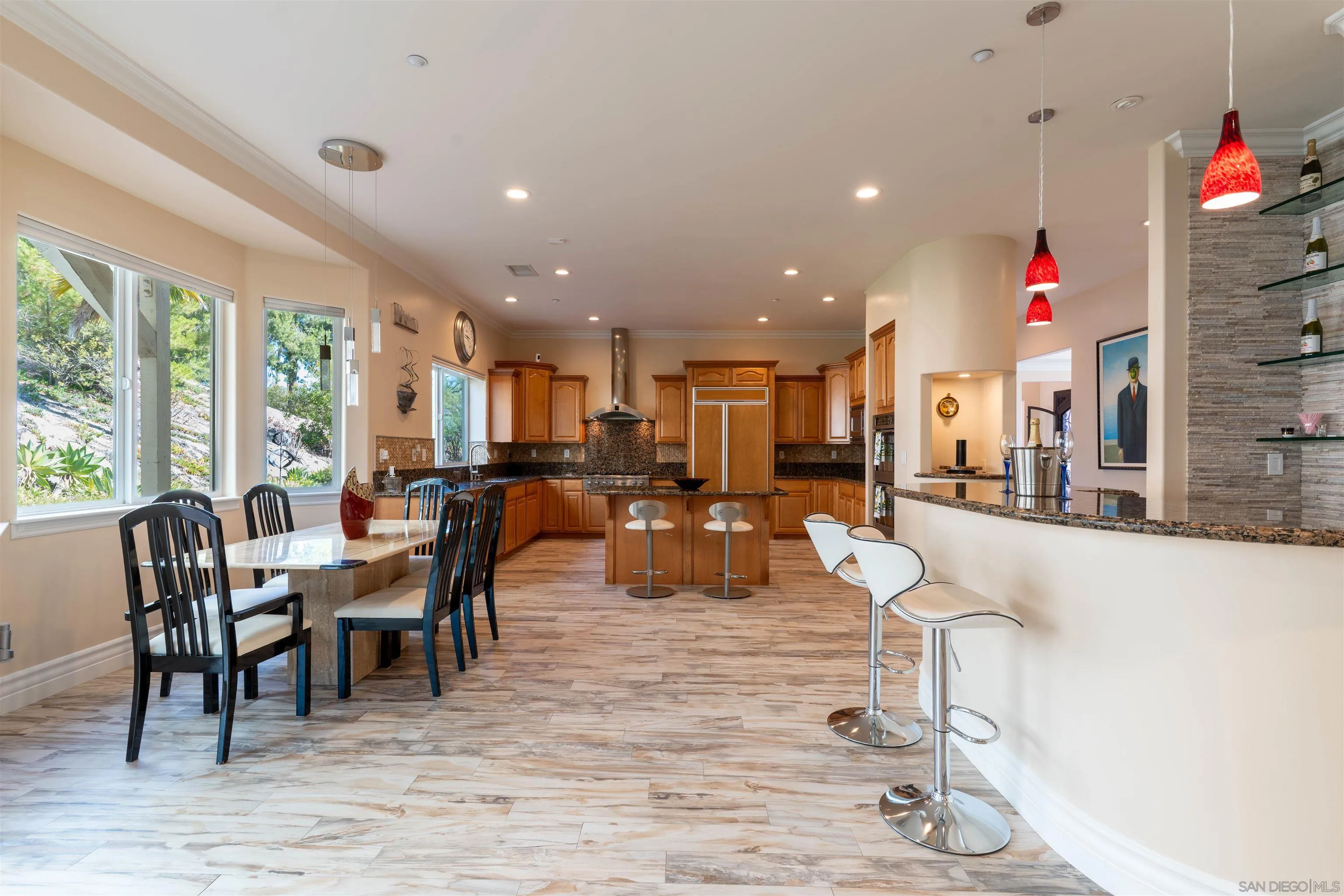 246 Yucca Road Fallbrook, CA 92028 - Photo 22 of 68 a view of a dining room with furniture window and wooden floor