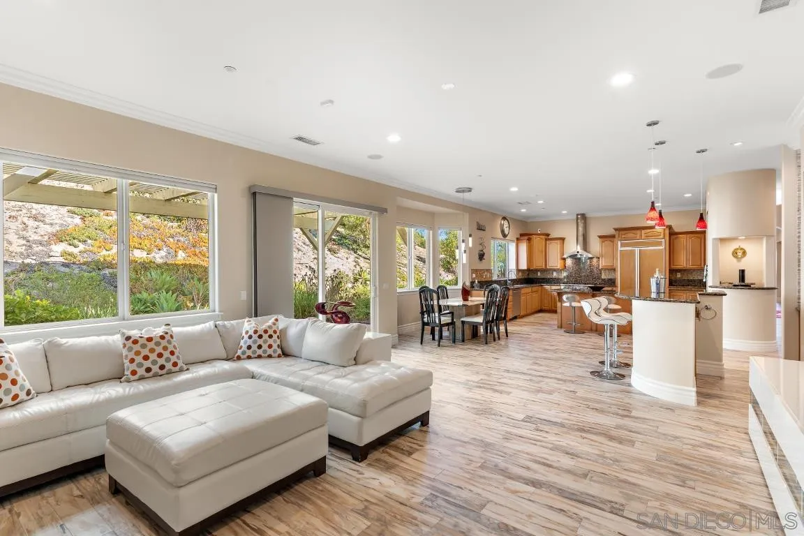 246 Yucca Road Fallbrook, CA 92028 - Photo 27 of 68 a living room with furniture and a large window