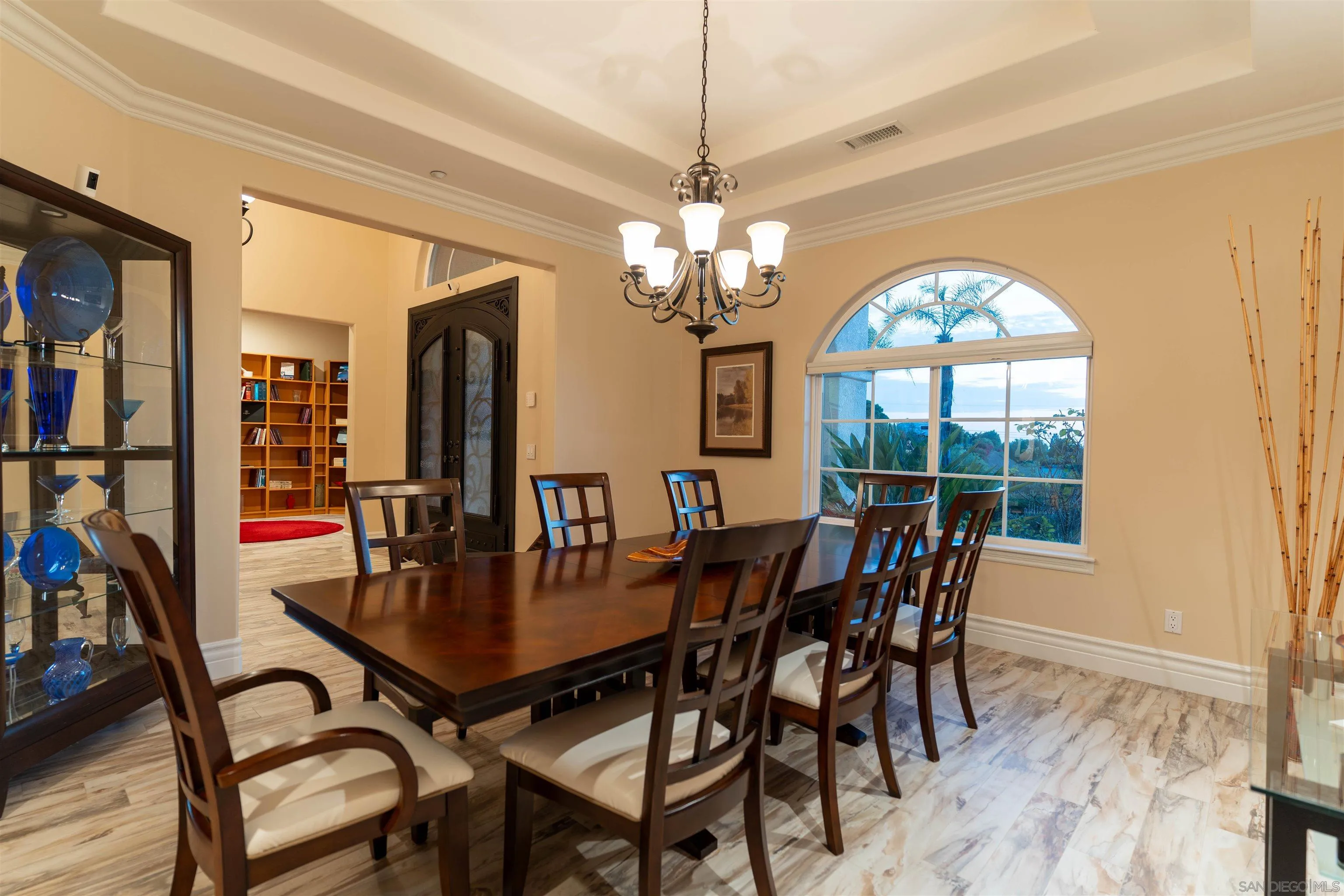246 Yucca Road Fallbrook, CA 92028 - Photo 32 of 68 a view of a dining room with furniture window and wooden floor