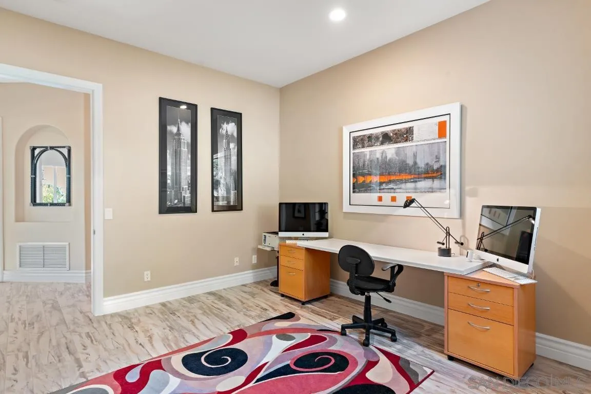 246 Yucca Road Fallbrook, CA 92028 - Photo 37 of 68 a view of a workspace with furniture and a window