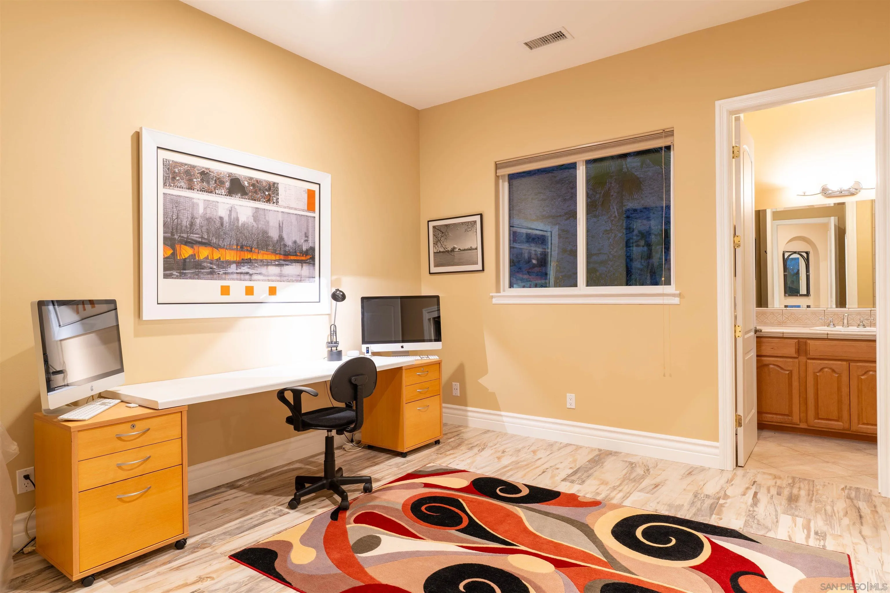 246 Yucca Road Fallbrook, CA 92028 - Photo 38 of 68 a view of a workspace with furniture and a window