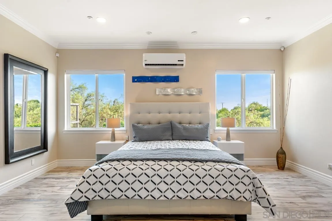 246 Yucca Road Fallbrook, CA 92028 - Photo 40 of 68 a bedroom with a large bed and a window