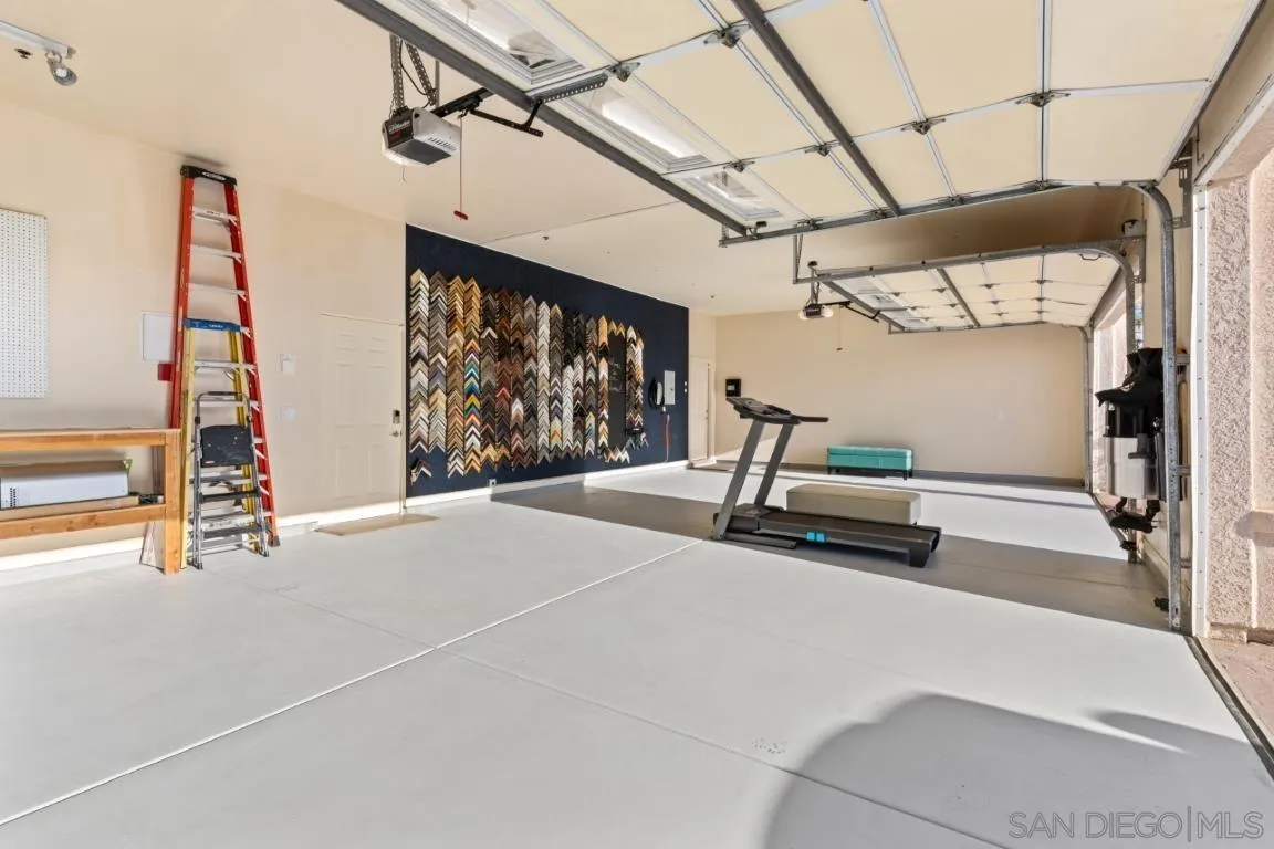246 Yucca Road Fallbrook, CA 92028 - Photo 47 of 68 a room with gym equipment and a window