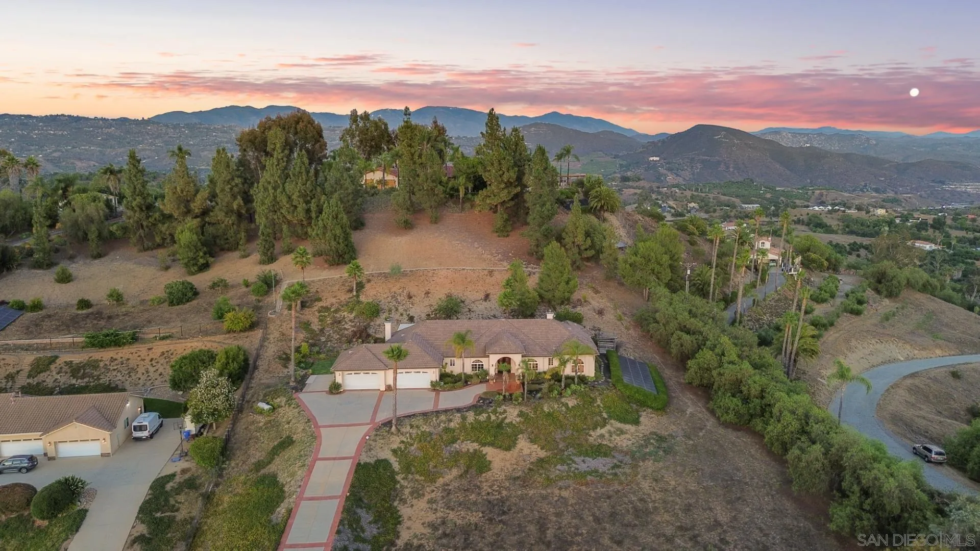 246 Yucca Road Fallbrook, CA 92028 - Photo 60 of 68 a view of a town with mountains in the background