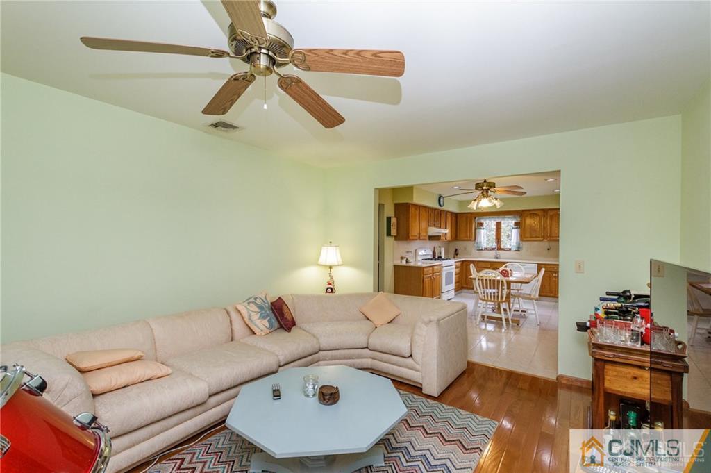 17 Garden Street East Hanover, NJ 07936 - Photo 13 of 34 a living room with furniture and a rug