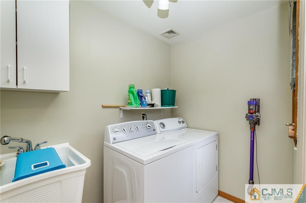17 Garden Street East Hanover, NJ 07936 - Photo 15 of 34 a utility room with dryer and washer