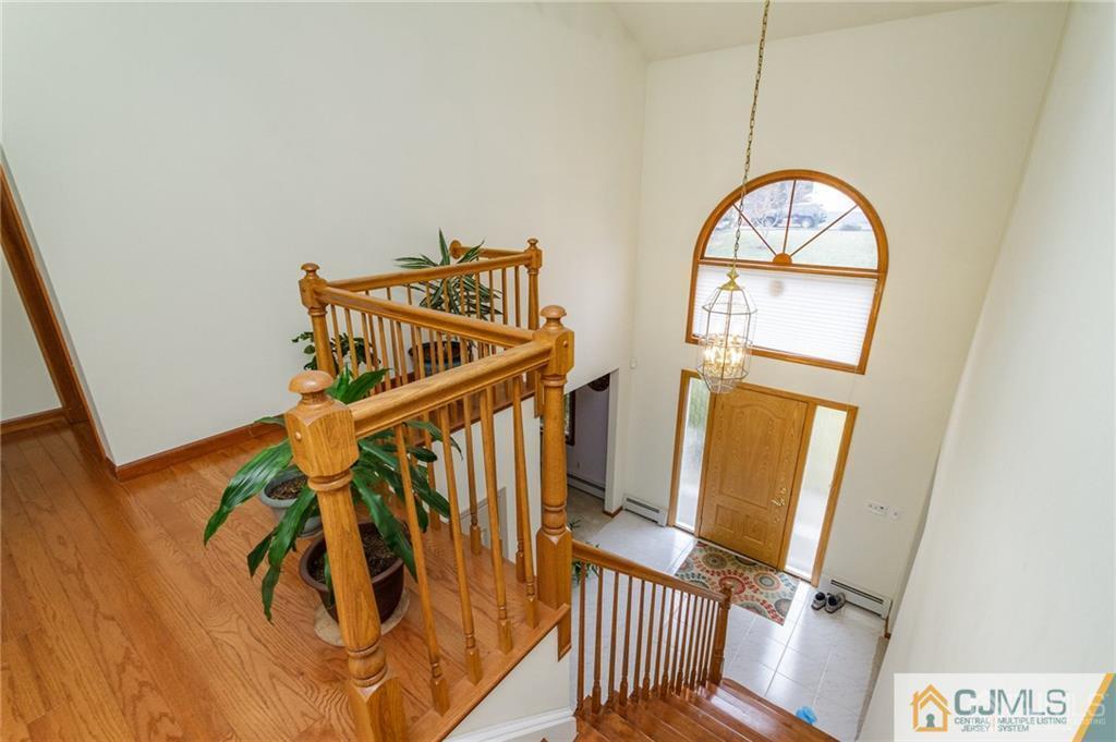 17 Garden Street East Hanover, NJ 07936 - Photo 16 of 34 a view of an entryway with wooden floor