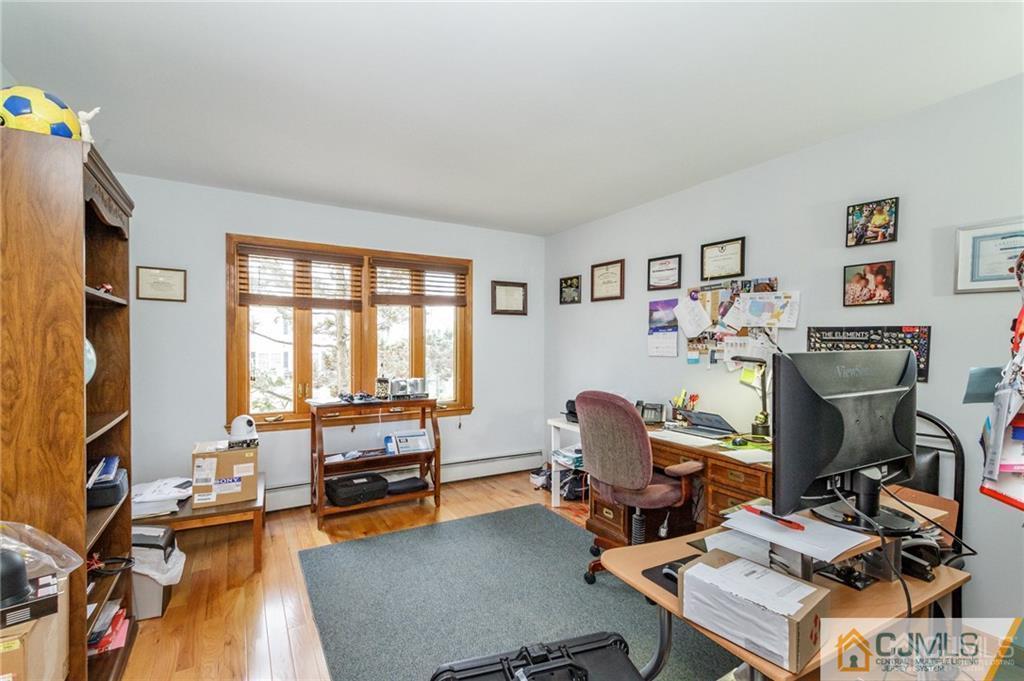 17 Garden Street East Hanover, NJ 07936 - Photo 18 of 34 a view of a workspace with furniture and a window