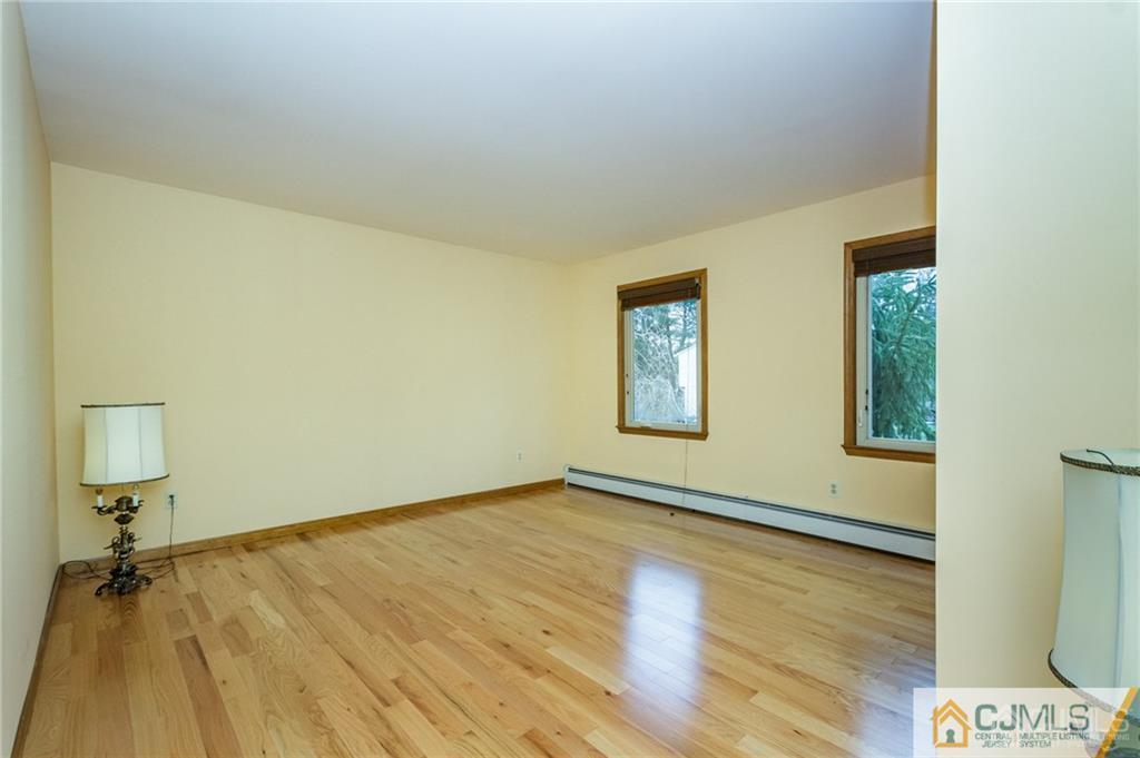 17 Garden Street East Hanover, NJ 07936 - Photo 24 of 34 a view of an empty room and wooden floor