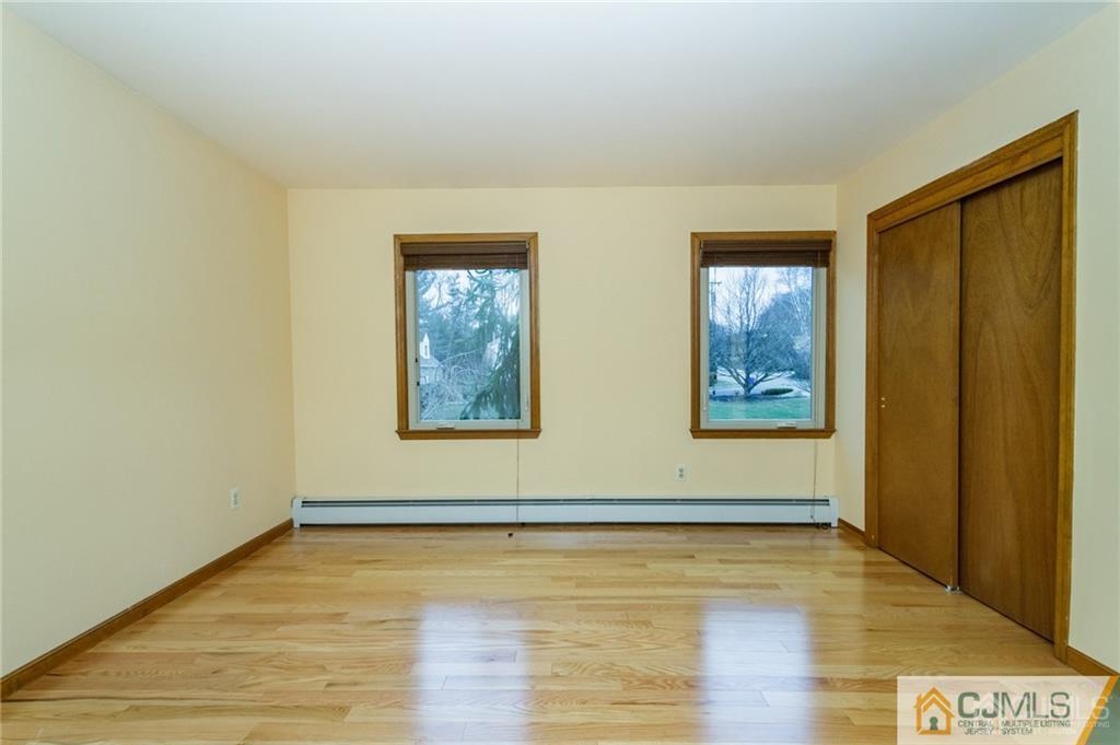 17 Garden Street East Hanover, NJ 07936 - Photo 25 of 34 a view of a room with wooden floor and window