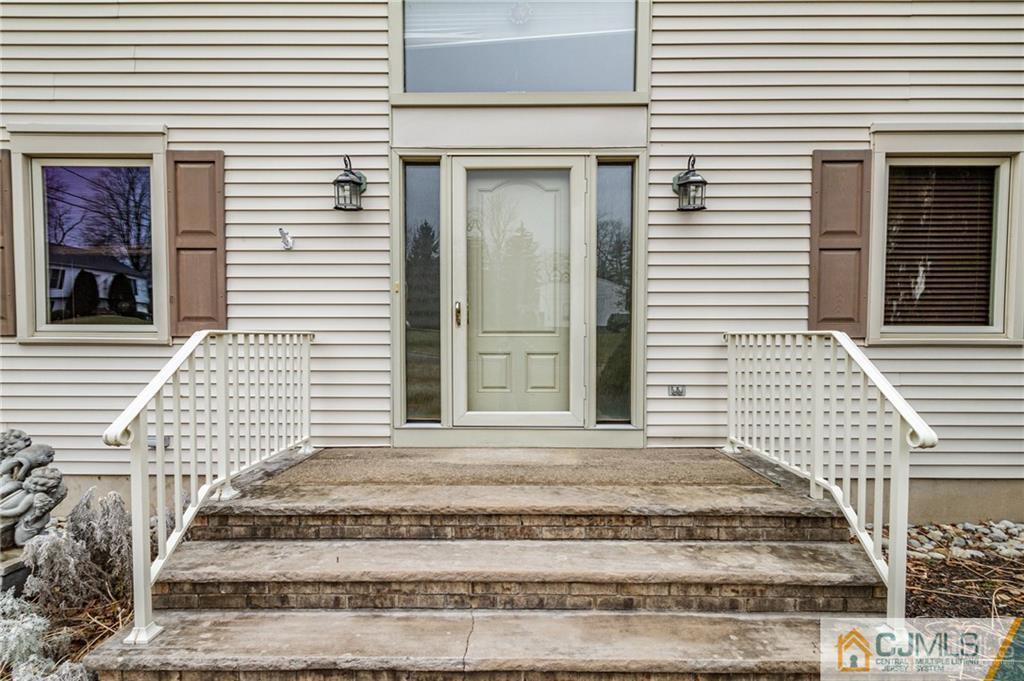 17 Garden Street East Hanover, NJ 07936 - Photo 3 of 34 a view of a house with a door and a outdoor space