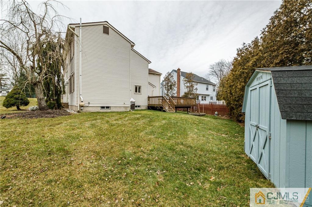 17 Garden Street East Hanover, NJ 07936 - Photo 33 of 34 a view of a house with a yard