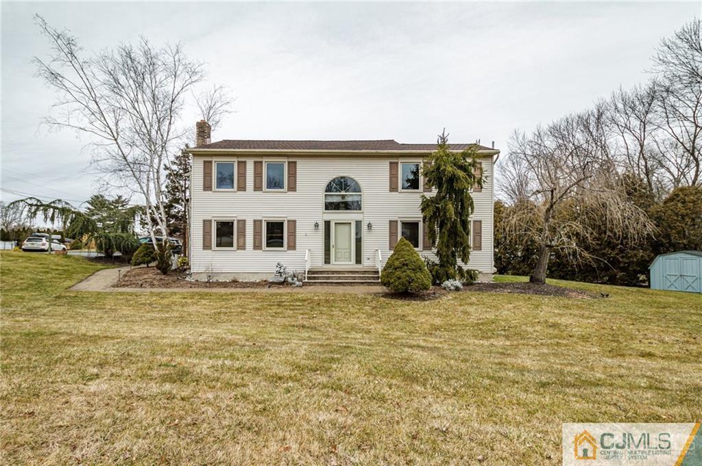 17 Garden Street East Hanover, NJ 07936 - Photo 34 of 34 a front view of a house with a yard