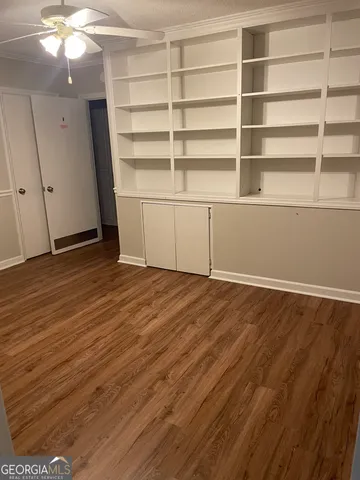 a view of a room with storage and utility room