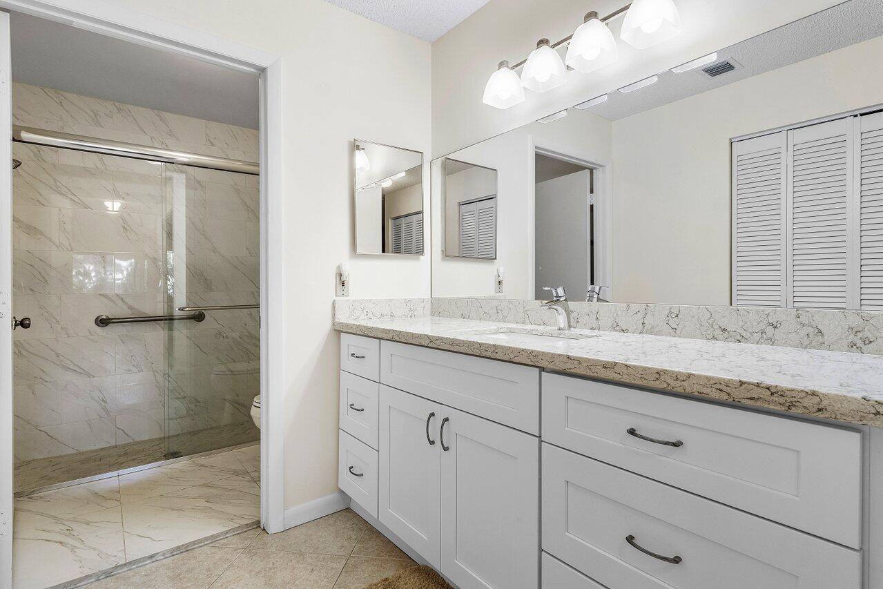8090 Whispering Palm Drive, Unit A Boca Raton, FL 33496 - Photo 20 of 33 MASTER BATHROOM