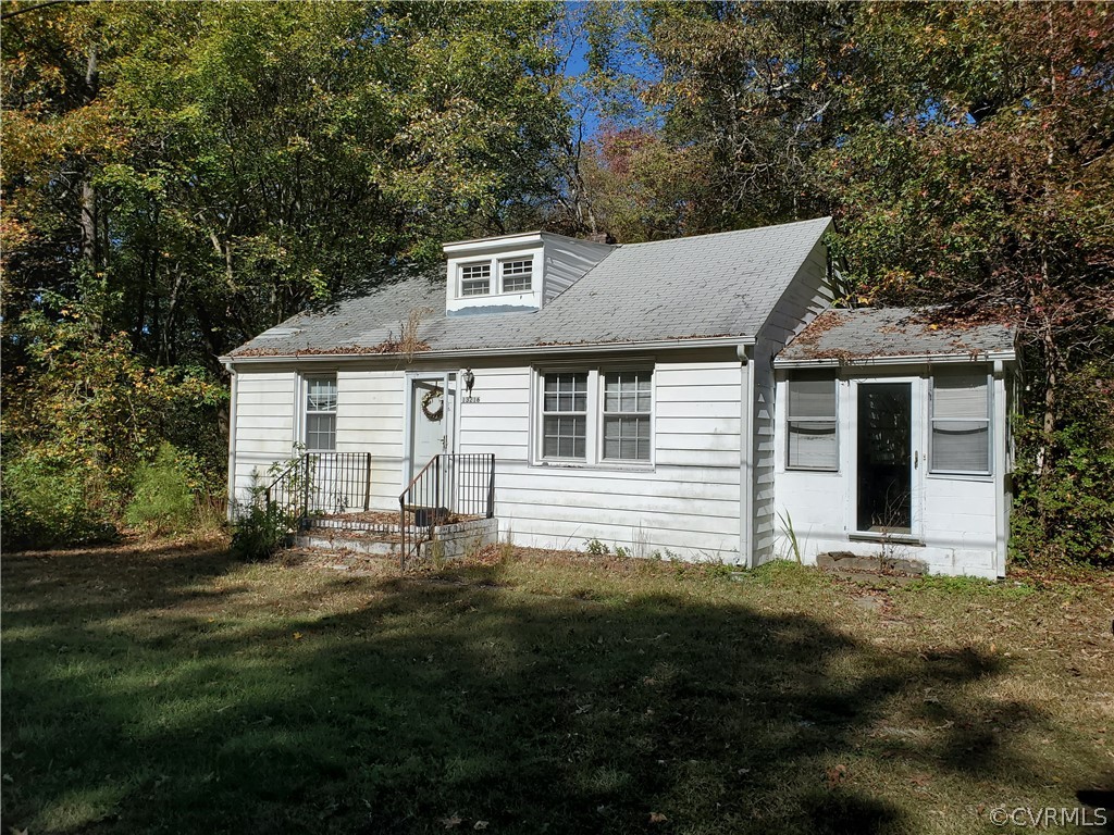 a backyard of a house with lots of green space