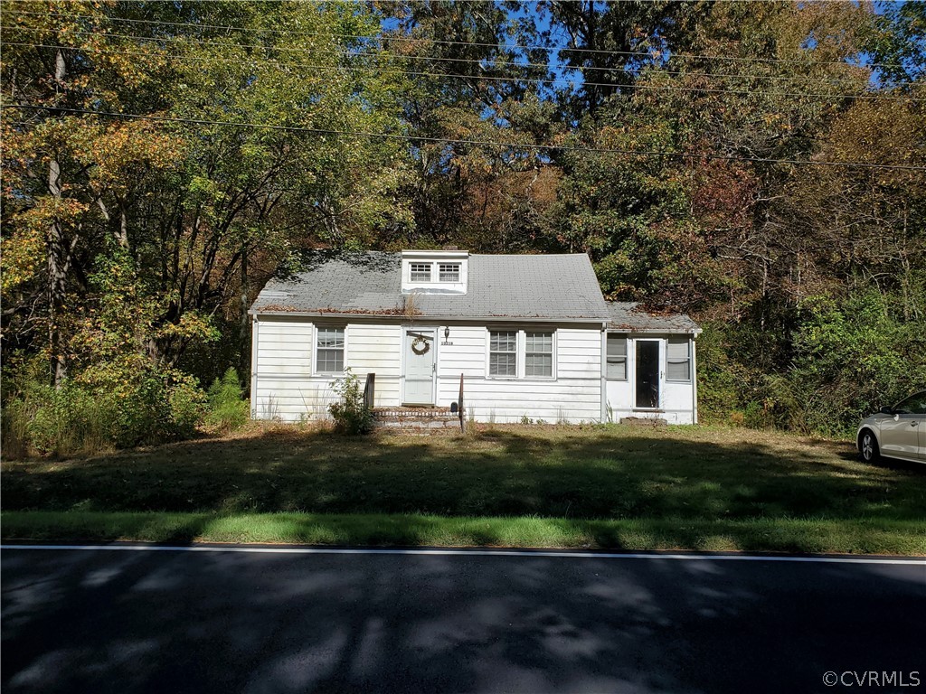 13216 Bradley Bridge Road Chester, VA 23831 - Photo 3 of 3 a front view of a house with a yard