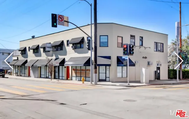 a front view of a building with street view