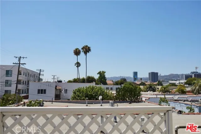a view of street with tall buildings