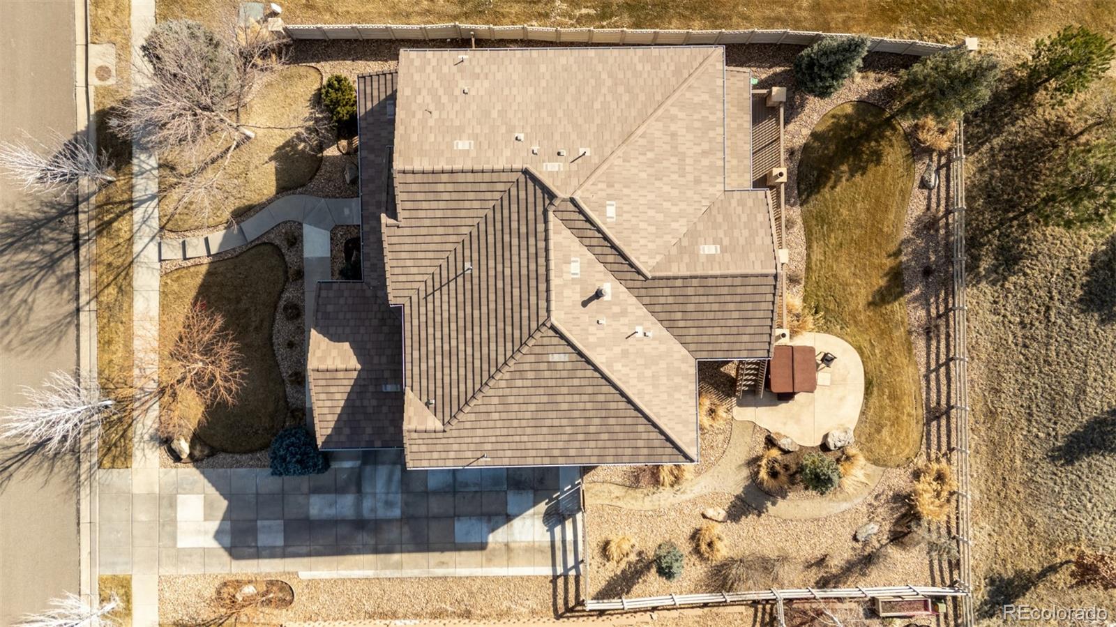 3422 Vestal Loop Broomfield, CO 80023 - Photo 39 of 50 a view of a house with a wooden door