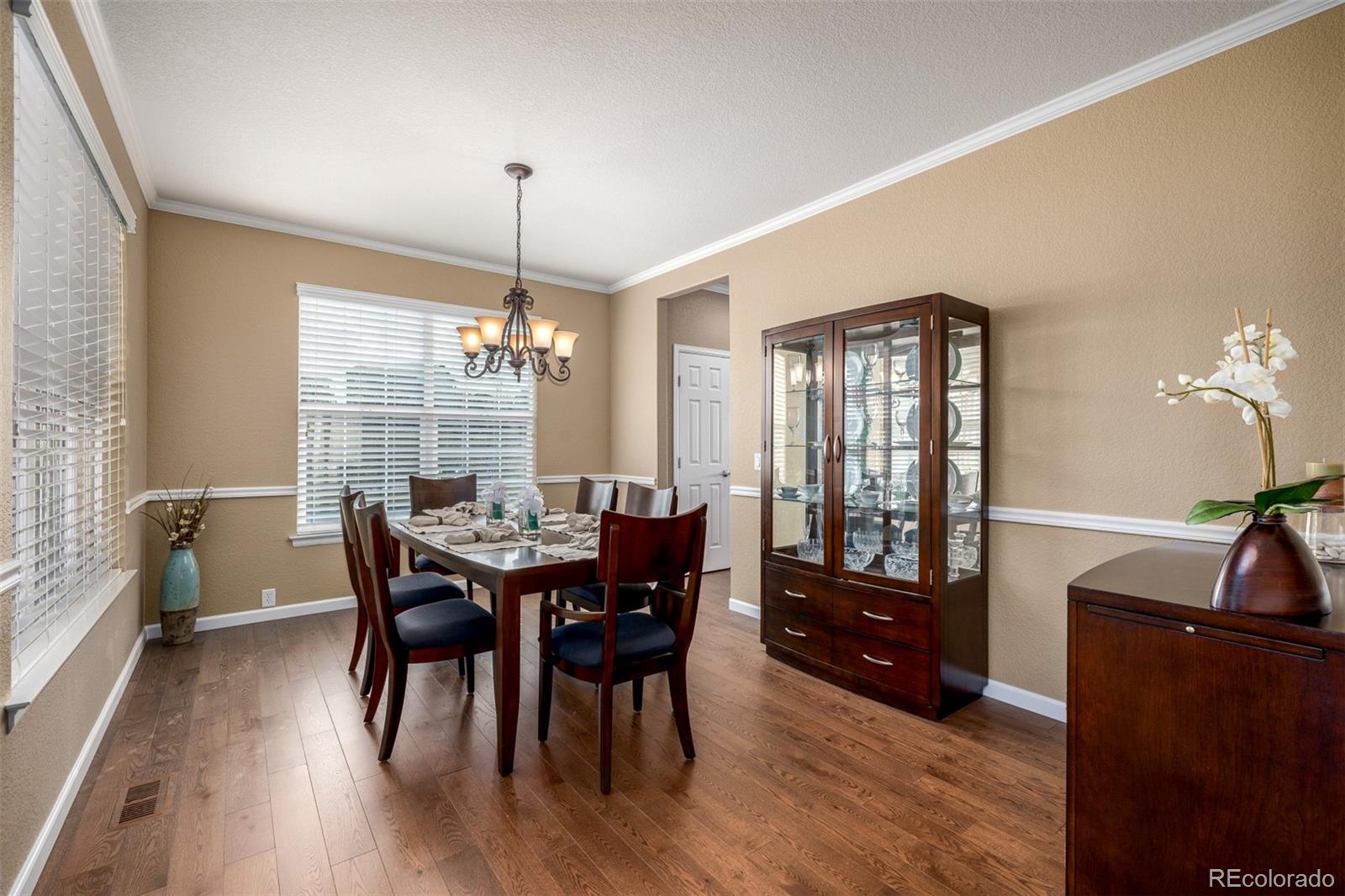 3422 Vestal Loop Broomfield, CO 80023 - Photo 9 of 50 a view of a dining room with furniture and window