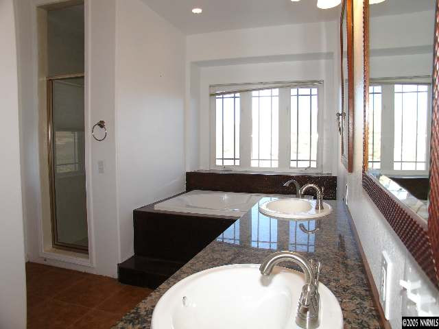 3055 Antelope Valley Road Reno, NV 89506 - Photo 8 of 9 a bathroom with a sink and a bathtub