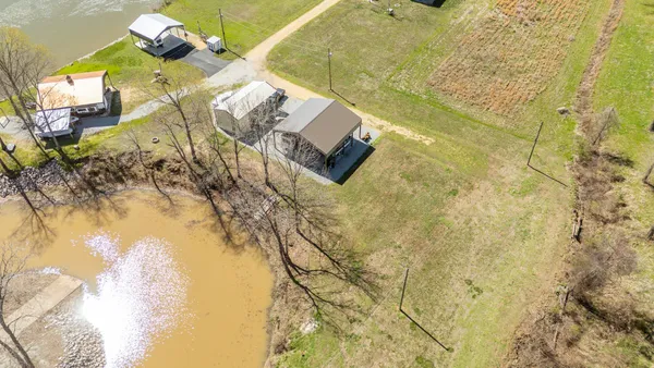 a view of a house with a big yard