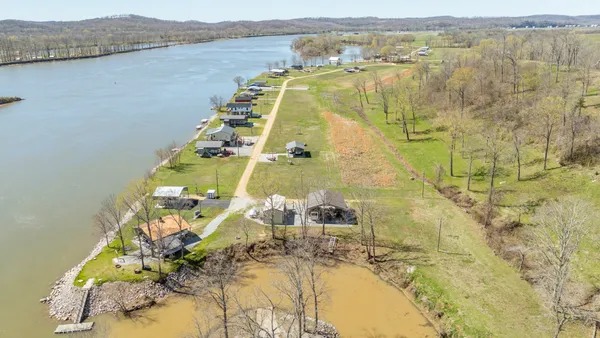 a view of a balcony with chairs