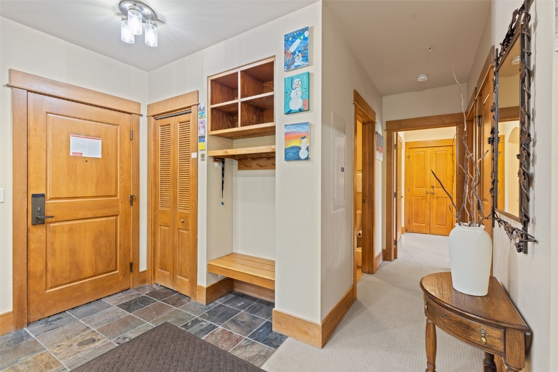 280 Trailhead Drive, Unit 3027 Keystone, CO 80435 - Photo 21 of 50 a view of an entryway with wooden floor
