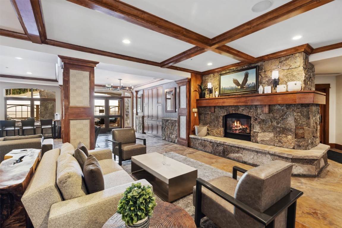 280 Trailhead Drive, Unit 3027 Keystone, CO 80435 - Photo 37 of 50 a living room with furniture and a fireplace