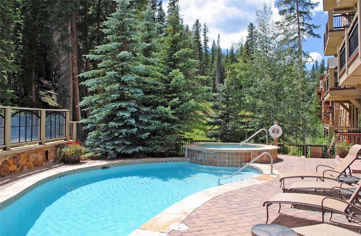 280 Trailhead Drive, Unit 3027 Keystone, CO 80435 - Photo 40 of 50 a view of a backyard with sitting area