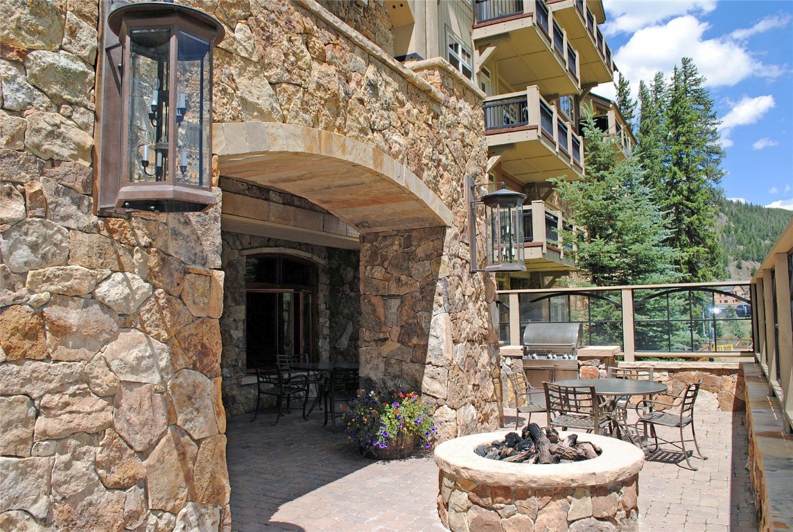 280 Trailhead Drive, Unit 3027 Keystone, CO 80435 - Photo 43 of 50 a view of a patio with table and chairs and potted plants