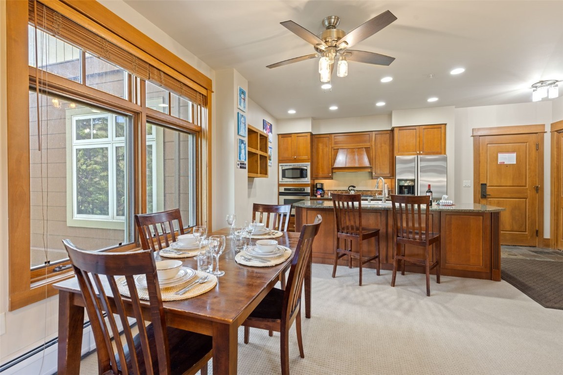 280 Trailhead Drive, Unit 3027 Keystone, CO 80435 - Photo 8 of 50 a view of a dining room with furniture window and outside view