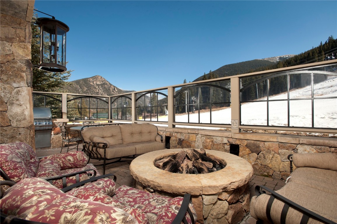 280 Trailhead Drive, Unit 3027 Keystone, CO 80435 - Photo 10 of 50 a view of a patio with couches table and chairs and potted plants