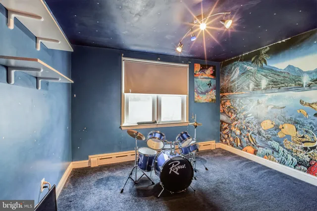 a view of a livingroom with furniture and chandelier