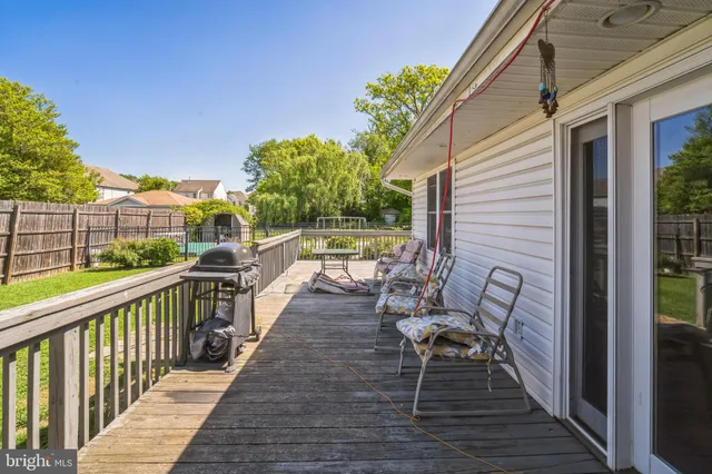 a view of balcony with furniture