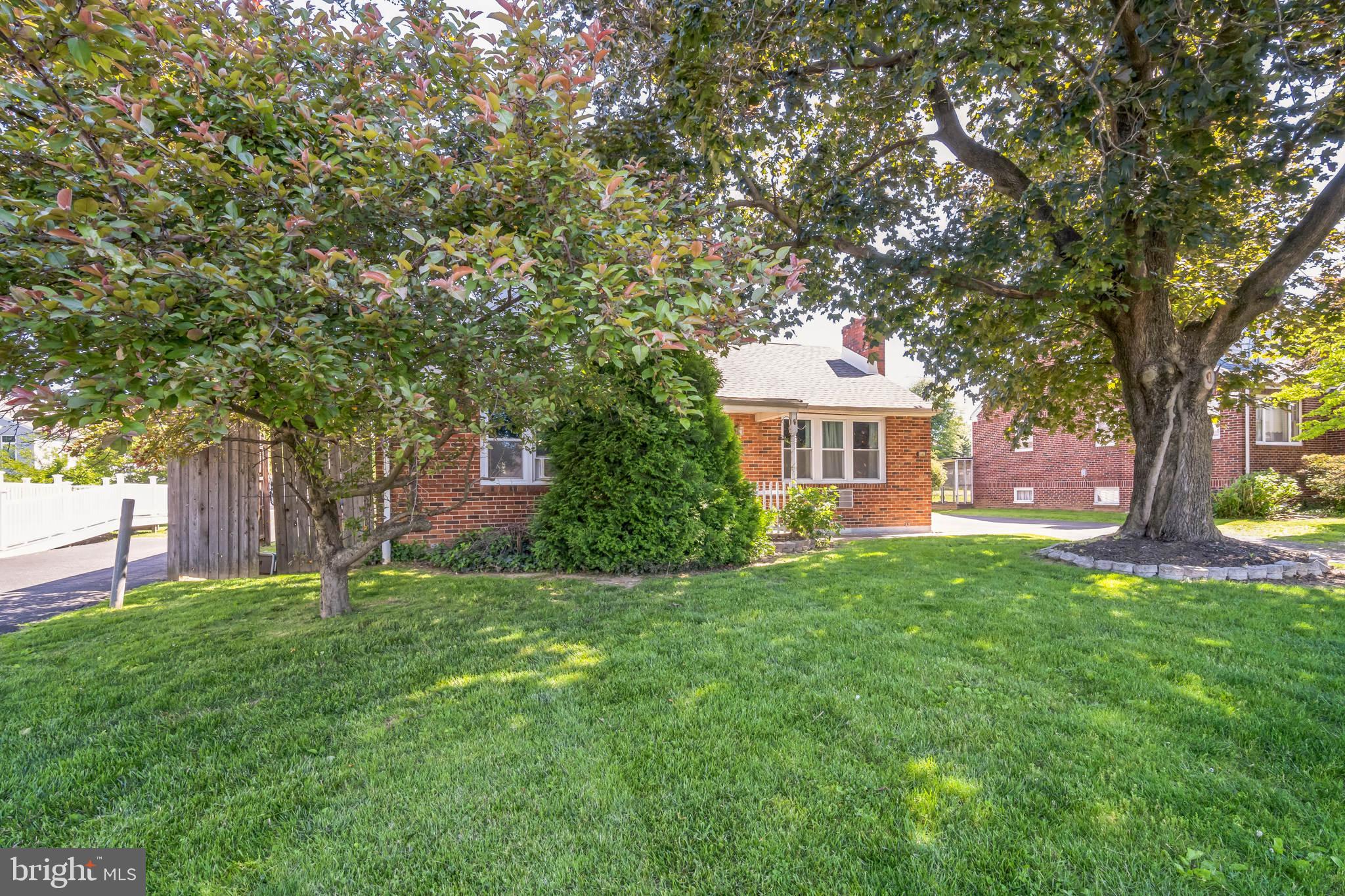 1443 Rhawn Street Philadelphia, PA 19111 - Photo 37 of 45 a front view of a house with a garden