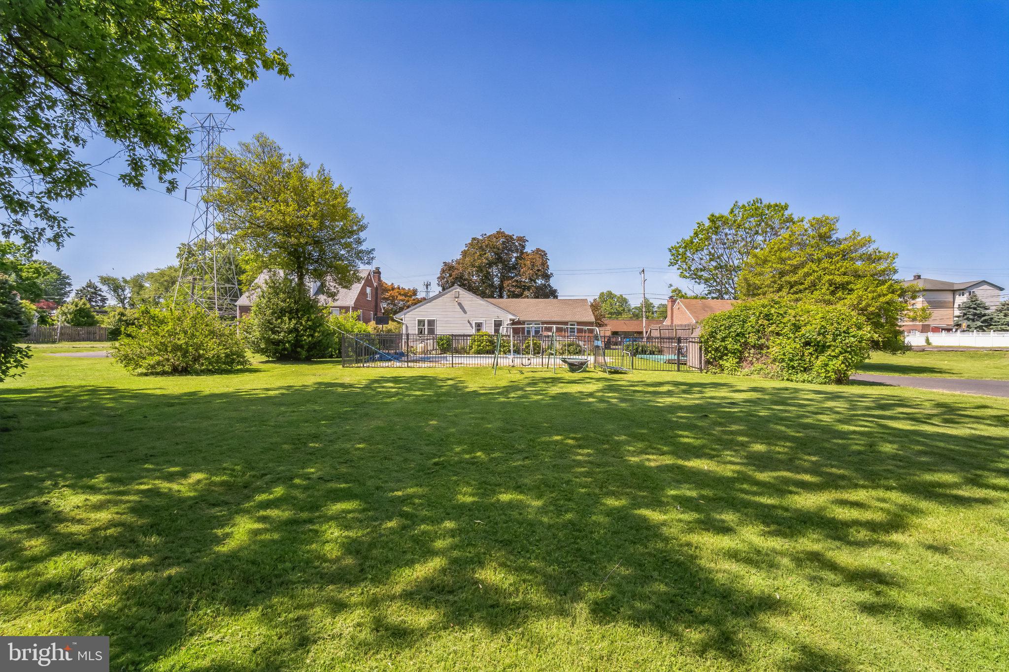 1443 Rhawn Street Philadelphia, PA 19111 - Photo 43 of 45 a garden with trees in the background