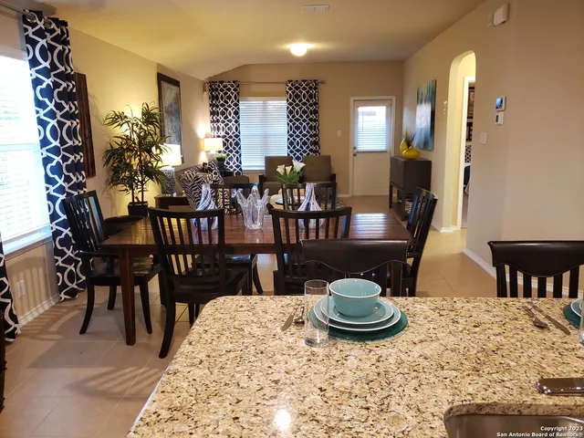 a view of a dining room with furniture