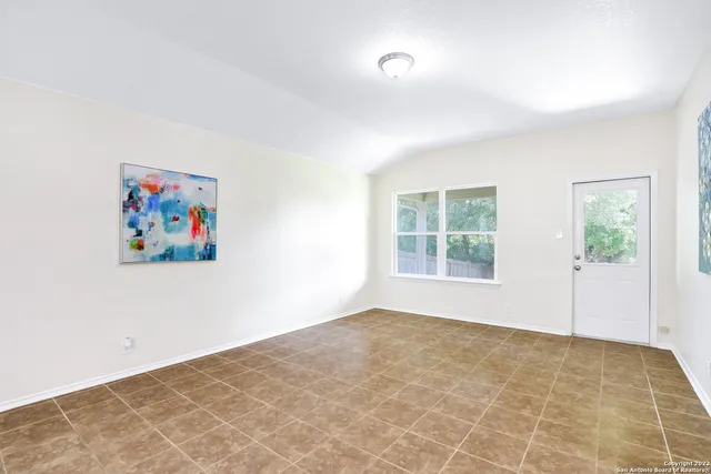 an empty room with windows