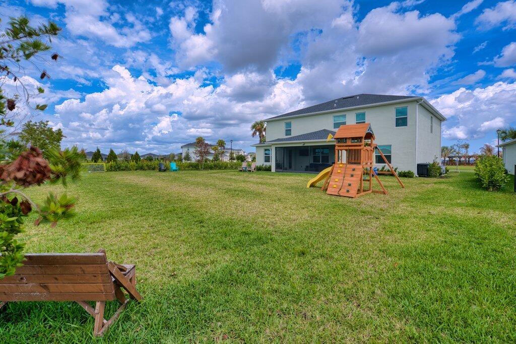 12328 Southwest Roma Circle Port St. Lucie, FL 34987 - Photo 62 of 72 Rear Exterior L.jpeg-SMALL