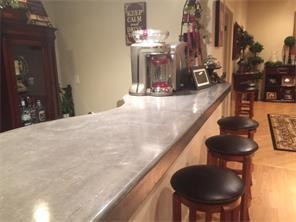 512 Central School Road Grindstone, PA 15442 - Photo 15 of 24 Trendy cement-top wet bar will have your guests talking!