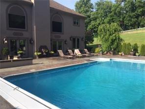 512 Central School Road Grindstone, PA 15442 - Photo 23 of 24 Heated in-ground pool makes stay-cations a fun place to be!