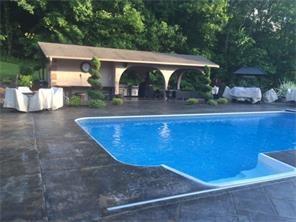 512 Central School Road Grindstone, PA 15442 - Photo 24 of 24 Custom-built tropical poolhouse provides a half bath